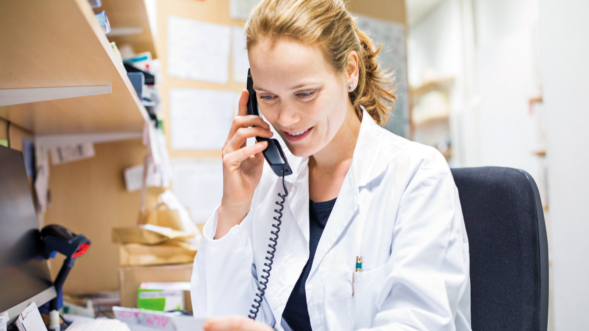 pharmacist checking medication phone.jpg