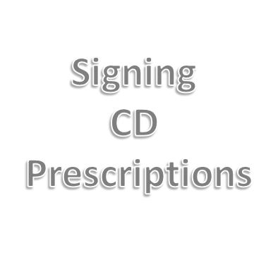 Signing CD prescriptions.JPG